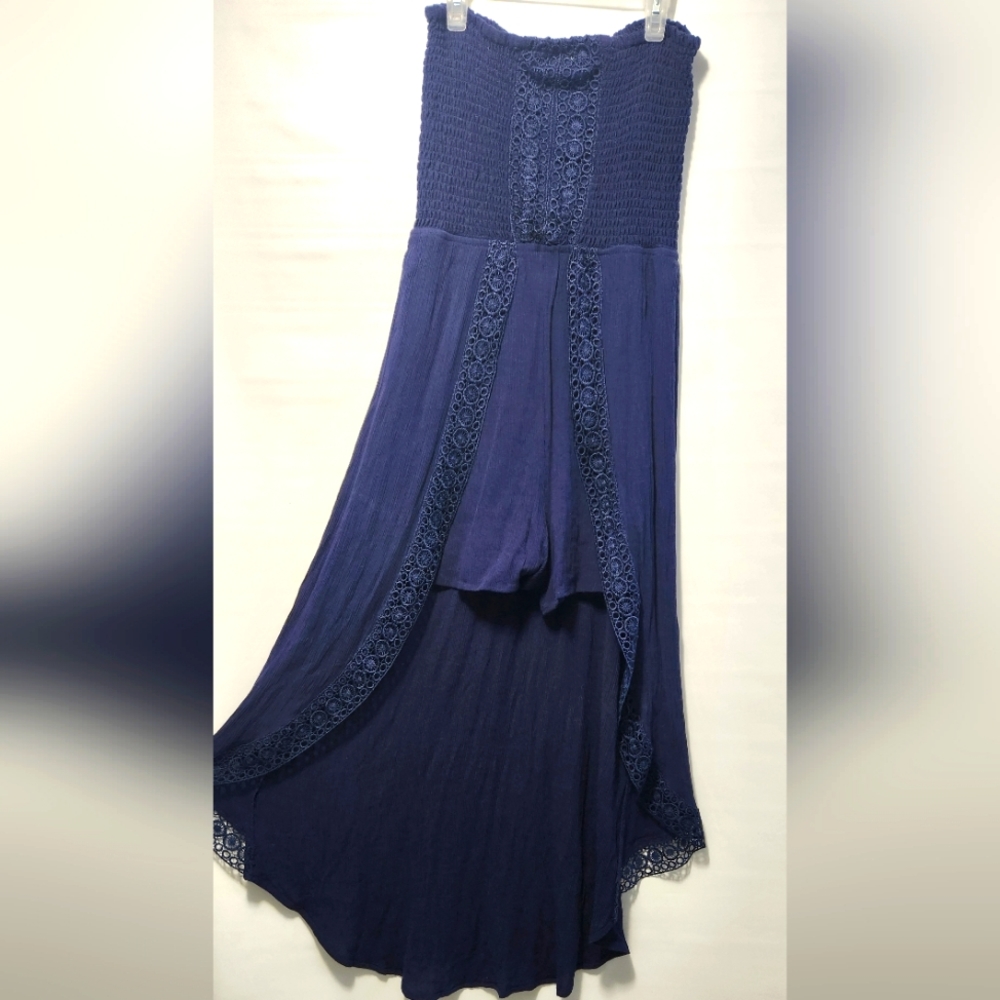Strapless romper with a train